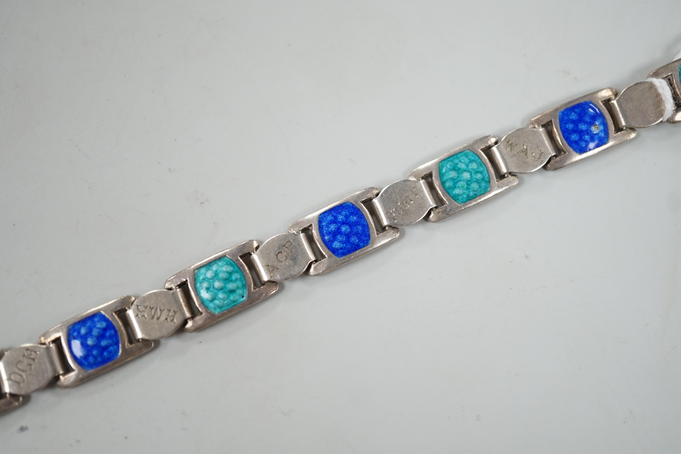 An Edwardian silver and two colour enamel bracelet, engraved with initials and words, 19cm.